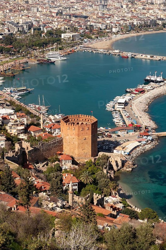 Alanya, Turkey. April 7th 2021 View of the Kizi Kule or Red Tower from the historic ancient castle walls, Alanya Harbour, on the Turkish Mediterranean, Turkey