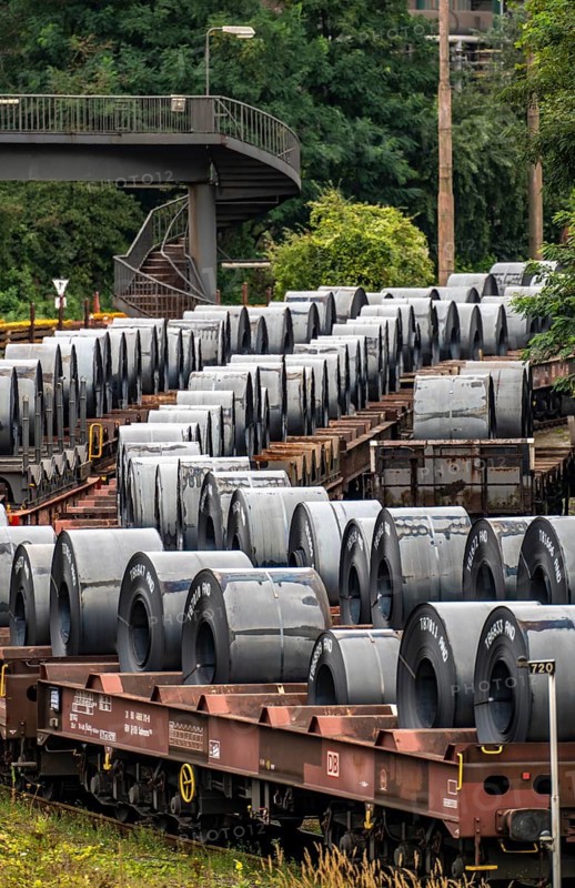 Strip steel coils, on freight wagons, at the ThyssenKrupp Steel plant Schwelgern in Duisburg-Marxloh is part of the Bruckhausen steelworks, North Rhine-Westphalia, Germany