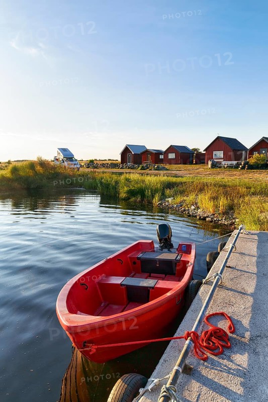 Traditional red fishing huts, holiday homes on the Baltic Sea coast, fishing port, coastal landscape, Bodudden, Löt, Öland island, Kalmar län, Sweden