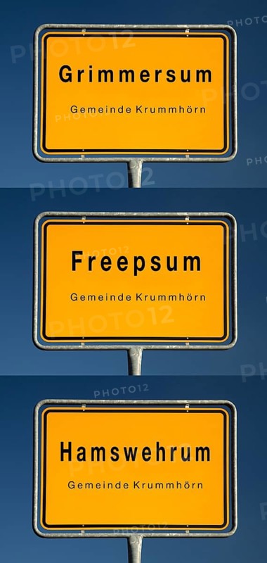 Place name signs for Grimmersum, Freepsum and Hamswehrum, villages in the municipality of Krummhörn, where the um means home in North Germany, district of Aurich, East Frisia, Lower Saxony, Germany