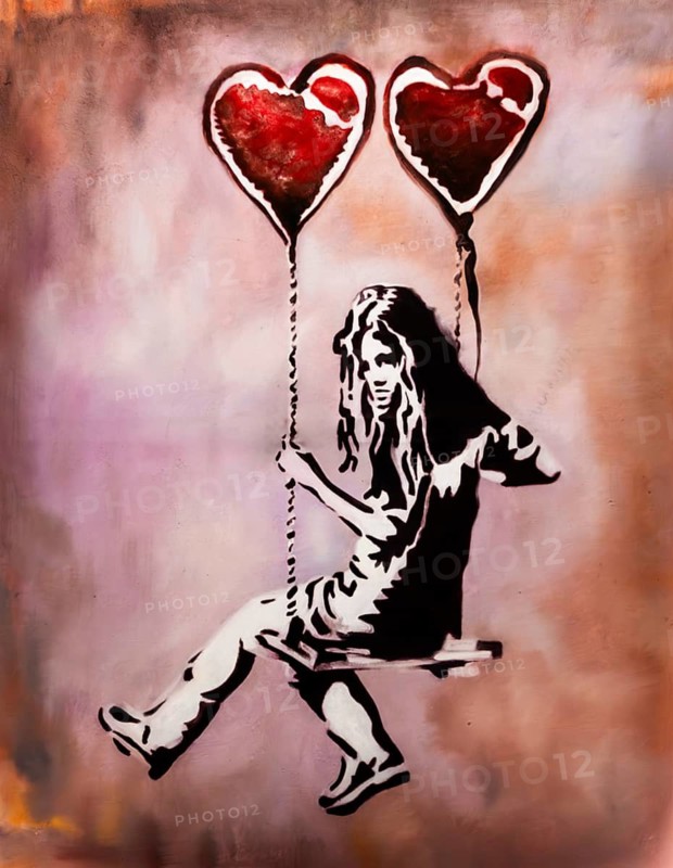 Banksy - Heart-Balloon-Girl riding on a swing, exhibition The World of Banksy