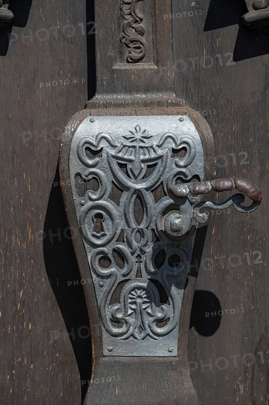 Old door fitting on the entrance door of St Martin's Church, Riegel am Kaiserstuhl, Baden-Württemberg, Germany
