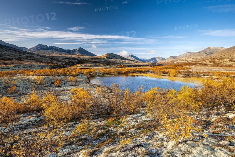 Autumn landscape in Rondane National Park, mountains Høgronden, Midtronden and Digerronden Dørålen, Dørålseter, Norway
