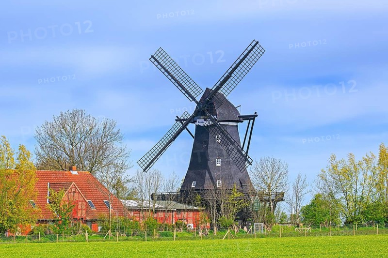 Windmill museum in old smock mill Jachen Flünk in the village Lemkenhafen on Fehmarn island, Ostholstein district, Schleswig-Holstein, Germany