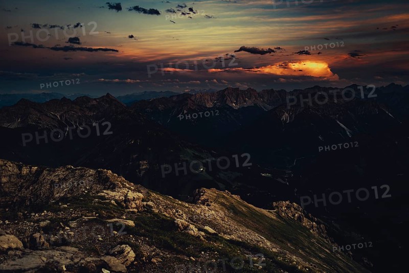 Thaneller summit at sunset in the Lechtal valley in Tyrol with a wonderful view of the surrounding mountains. Tyrol, Austria