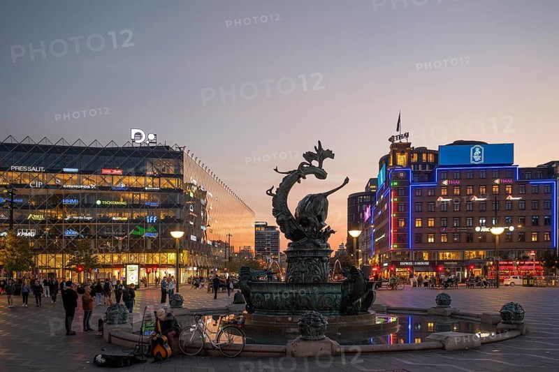 Neon sign, fountain, City Hall Square or Rådhuspladsen in the evening, Hans Christian Andersen's Boulevard, Copenhagen, Denmark