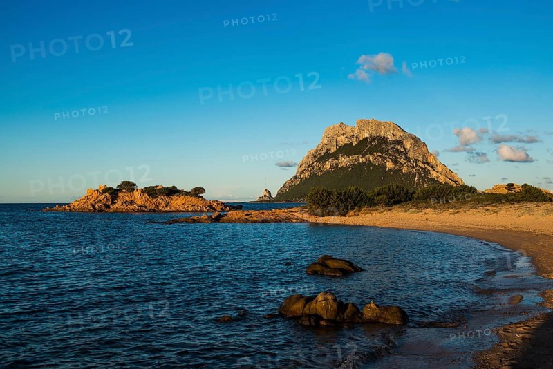 Picturesque beach and island, sunset, Isola di Tavolara, Porto San Paolo, Sardinia, Italy