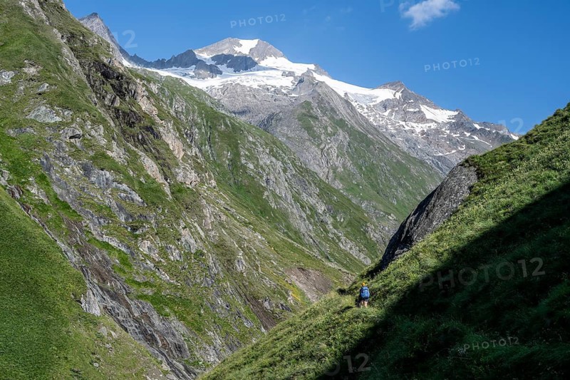 View of Rötspitze, hiker in Umbaltal, Hohe Tauern National Park, East Tyrol, Tyrol, Austria