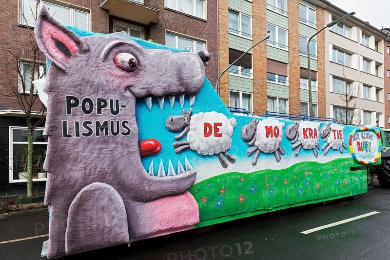 Populism wolf eats democracy sheep, political theme car, Düsseldorf Rose Monday procession, Düsseldorf, North Rhine-Westphalia, Germany