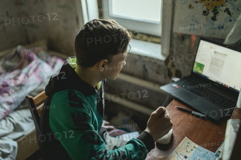 Ihor, 14 years old, homeschooling in the village of Borshchivka, which was occupied by the Russian army for over six months, the front is only a few kilometres away as the crow flies, Borshchivka, Raion Isyum, Kharkiv Oblast, Ukraine