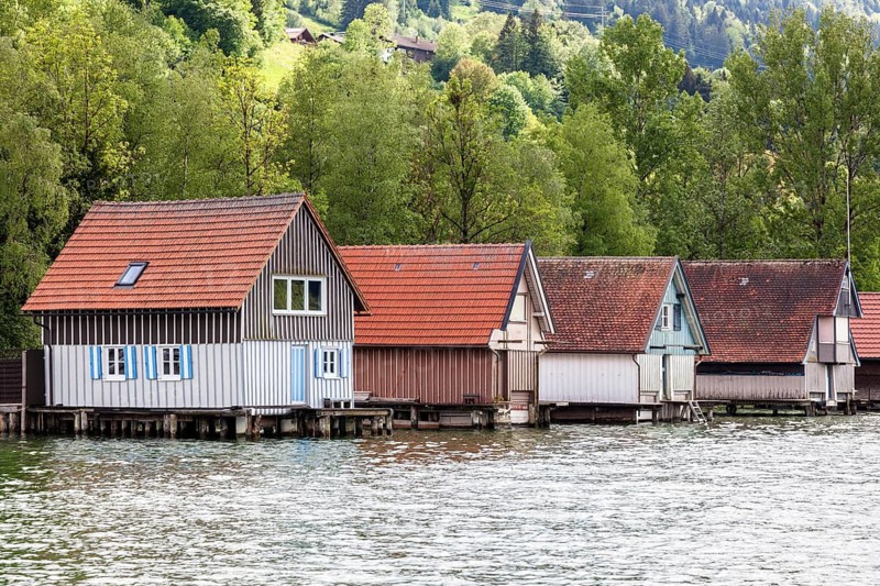Boathouses in Bühl, Großer Alpsee, near Immenstadt, Oberallgäu, Allgäu, Bavaria, Germany