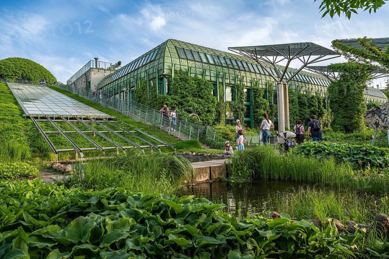 WARSAW, POLAND, MAY 23, 2023: People on the green roof of the University of Warsaw Library