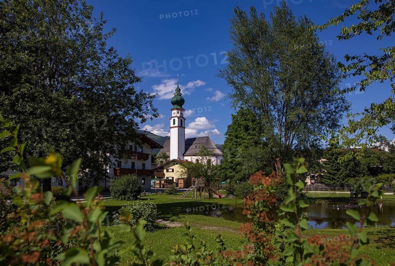 View of the village with parish church, Breitenbach am Inn, Inntal, Tyrol, Austria