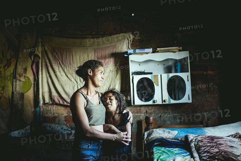 María with one of her four daughters, the eldest joined a criminal gang at 13, Túrgua, Venezuela