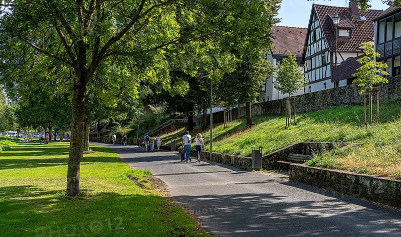 Cyclists and pedestrians on the banks of the Main, Seligenstadt, Hesse, Germany