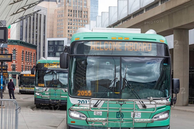 Detroit, Michigan - Detroit City Buses are parked at the Rosa Parks Transit Center, the city's main local bus station