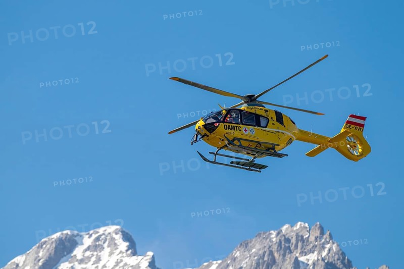 Rescue helicopter, emergency helicopter in flight, Schwaz, Tyrol, Austria