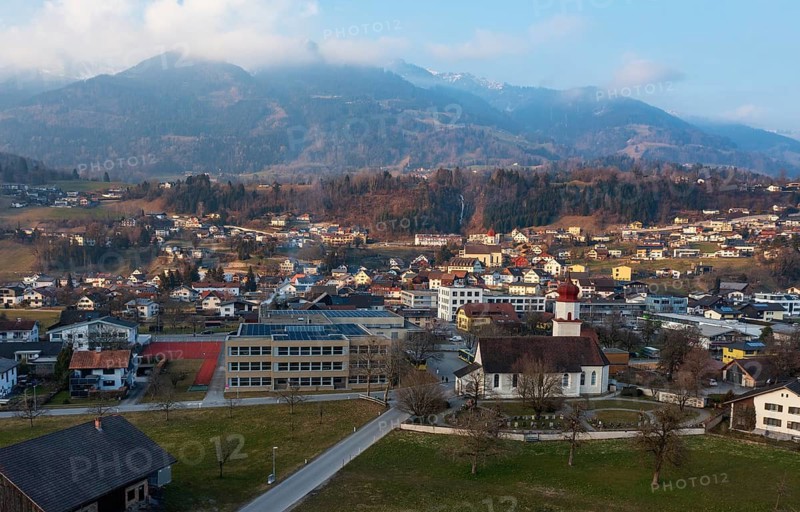 Drone image, residential buildings, settlement area, parish church, Thuringia, Großes Walsertal, Vorarlberg, Austria