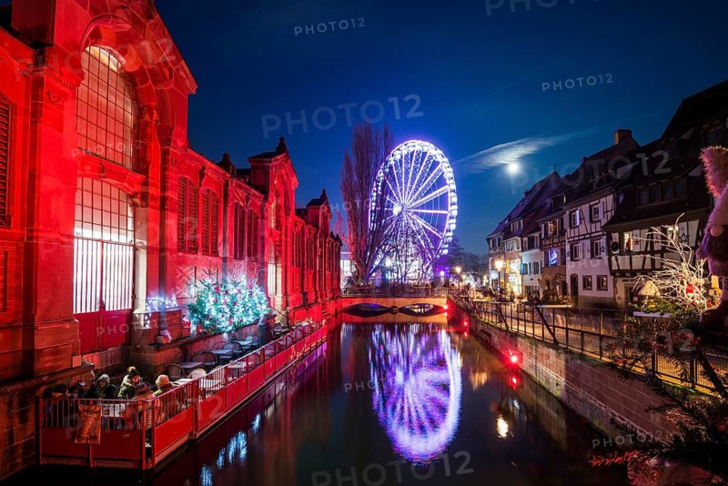 Colourfully illuminated and Christmassy decorated half-timbered houses, old town, blue hour, Colmar, Haut-Rhin department, Alsace, France