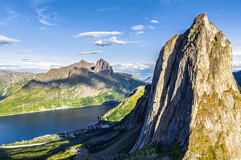 Aerial view of Mt. Segla, in the back Mt. Breidtinden, Senja Island, Norway