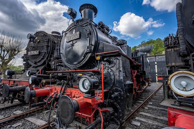 Ring locomotive shed with many historic steam locomotives in the Bochum Railway Museum, museum days weekend, with many attractions such as steam locomotive rides, 3 locomotives are under steam, historic trains make round trips through the Ruhr Valley, many locomotives are on display, on the site of the former Dahlhausen railway depot, North Rhine-Westphalia, Germany