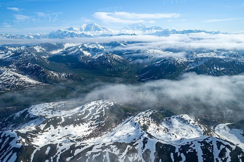 Clouds over high mountains, Mt Foraker and Mt Denali or Mount McKinley, aerial view, Alaska Range, Denali National Park, Alaska, USA