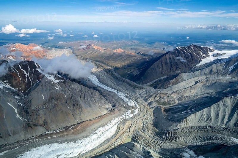 Glacier bed and colored mountains, aerial view, Alaska Range, Denali National Park, Alaska, USA