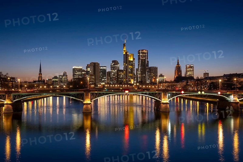 The lights of Frankfurt's banking skyline glow in the evening, Frankfurt am Main, Hesse, Germany