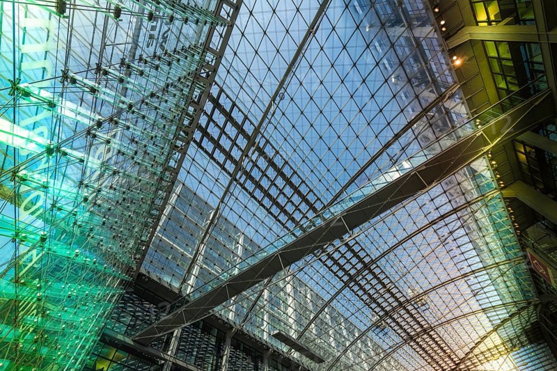 Everyday scenes, travelers and railway employees as well as the interior design, signs, signposts and the DB travel center, in and at Berlin Central Station, Germany