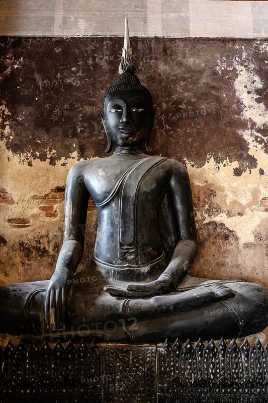 Bangkok, Thailand. February 20th 2025. A black Buddha statue on display in the The Wat Suthat Thepwararam Temple