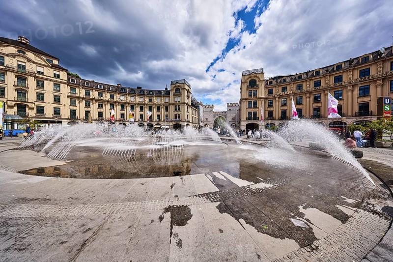 Fountain, general architecture, historic buildings, Stachus roundel, neo-baroque style, architect Gabriel von Seidl, pedestrian zone, square, blue sky, white and dark gray cumulus clouds, Stachus, Karlsplatz, Munich, state capital, district-free city, Bavaria, Germany
