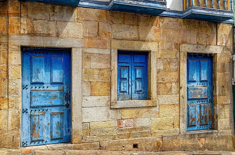 Facade of an old colonial house built with stones in the city of Ouro Preto, Ouro Preto, Minas Gerais, Brazil