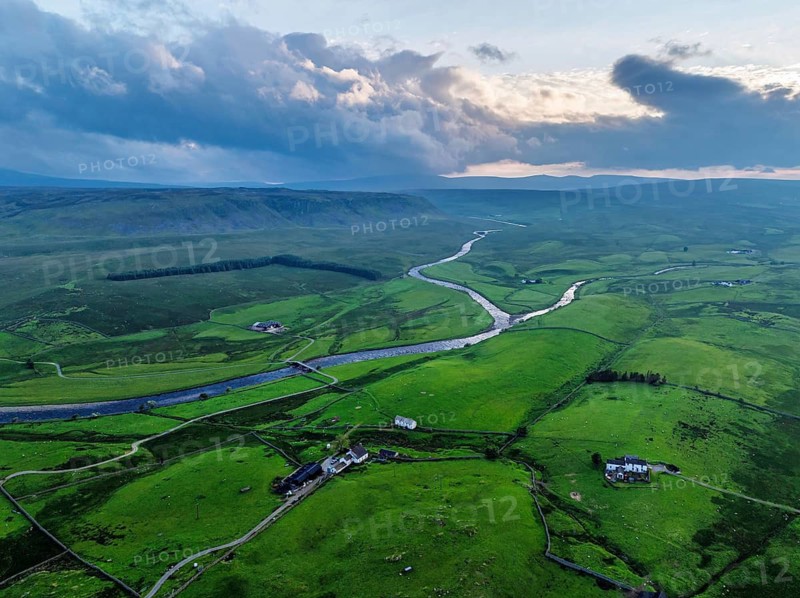 Forest in Teesdale over River Tees from a drone, North Pennines AONB, County Durham, England, United Kingdom