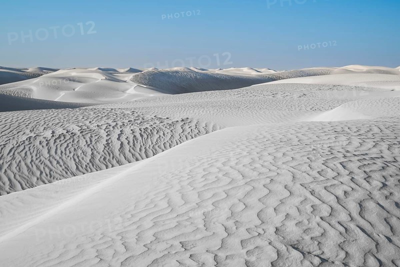 White sand dunes in the Khaluf Desert, Oman