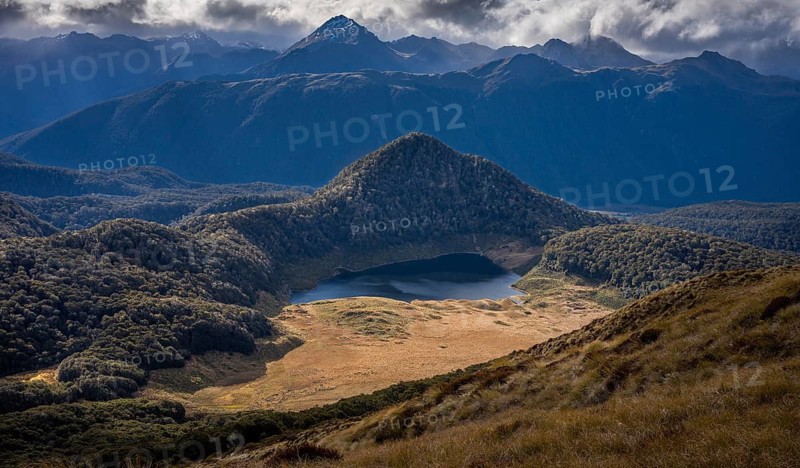 Mountain landscape with lake. View from Mount Burns, Borland Road Area, Fiordland National Park, Southland Region, South Island, New Zealand