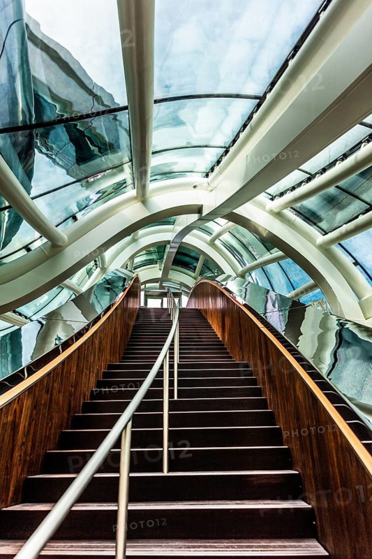 Spectacular double spiral staircase from ground floor to roof terrace, offering breathtaking views over the Maas and Hotel New York, FENIX, museum about migration, in a historic warehouse in Katendrecht, Rotterdam, the Netherlands