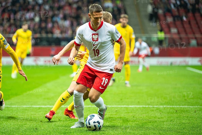 WARSAW, POLAND - MARCH 21, 2025: Qualifications for FIFA World Championship 2026. Match Poland - Lithuania 1:0. In action Przemyslaw Frankowski