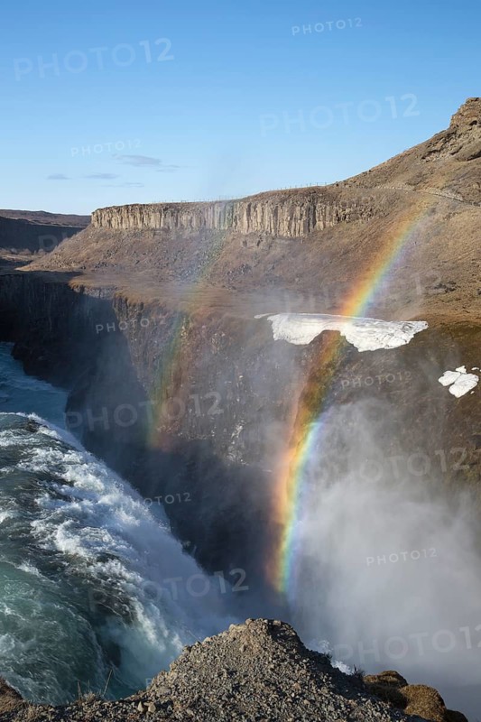 Gullfoss (Golden Falls is a waterfall located in the canyon of the Hvítá river in southwest Iceland. Rainbow over the waterfall