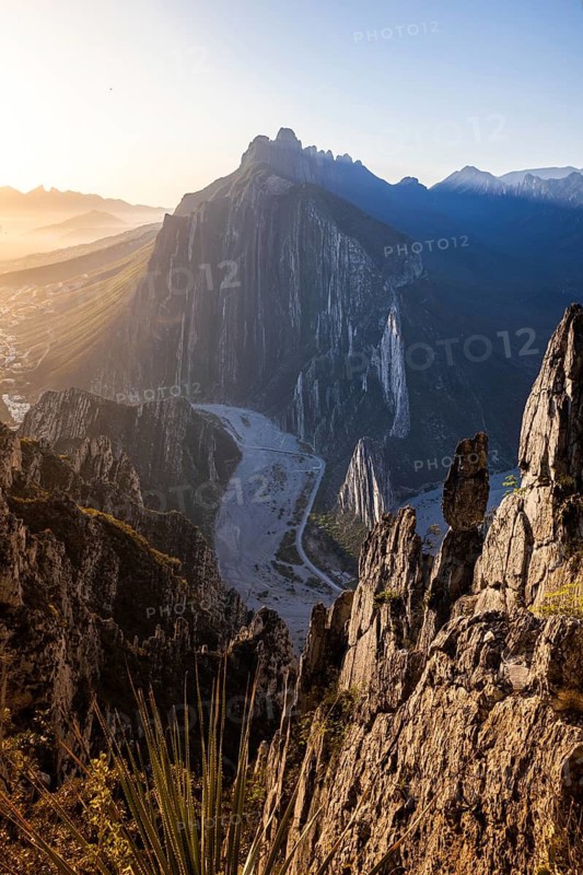 Sunrise over the majestic Eagleâ€™s Nest in Monterrey, Mexico, offering a breathtaking view of rugged cliffs and valleys bathed in golden light, showcasing nature's stunning beauty