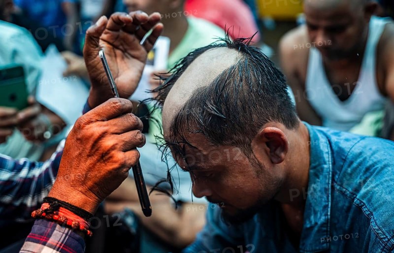 Drivers affiliated with Ola, Uber, and Rapido, under the banner of the Assam State Drivers' Union and the All Assam Cab Welfare Federation, shaved their heads in protest in Guwahati, India, on July 22, 2025. The demonstration held to highlight their demands for fair fare rates, regulation of aggregator commissions, and access to social security and welfare benefits
