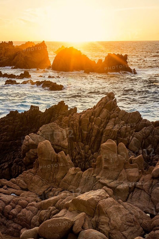 Red rocks by the sea, sunset, Costa Paradiso, Sardinia, Italy