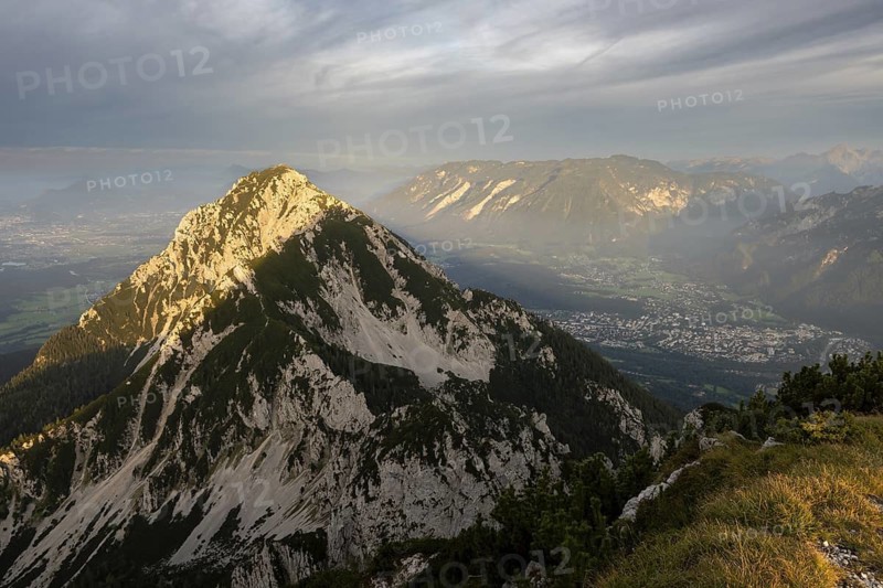 Sunset view from the summit of Zwiesel to Hochstaufen and of Salzburg and Bad Reichenhall, Chiemgau Alps, Bavaria, Germany