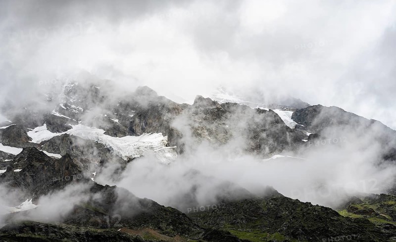 Cloudy mountain peaks, Bernese Alps, Bernese Oberland, Switzerland