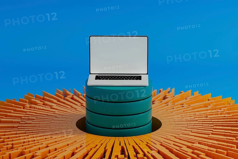 A laptop stands surrounded by vibrant data elements, symbolizing connection and network activity for artificial intelligence technology