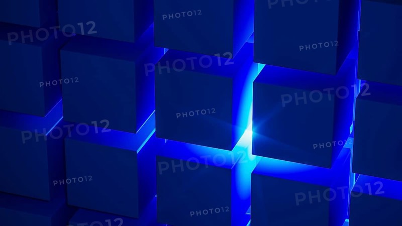Cube structures create a captivating geometric arrangement highlighted by blue light, showcasing modern design concepts and technological inspiration