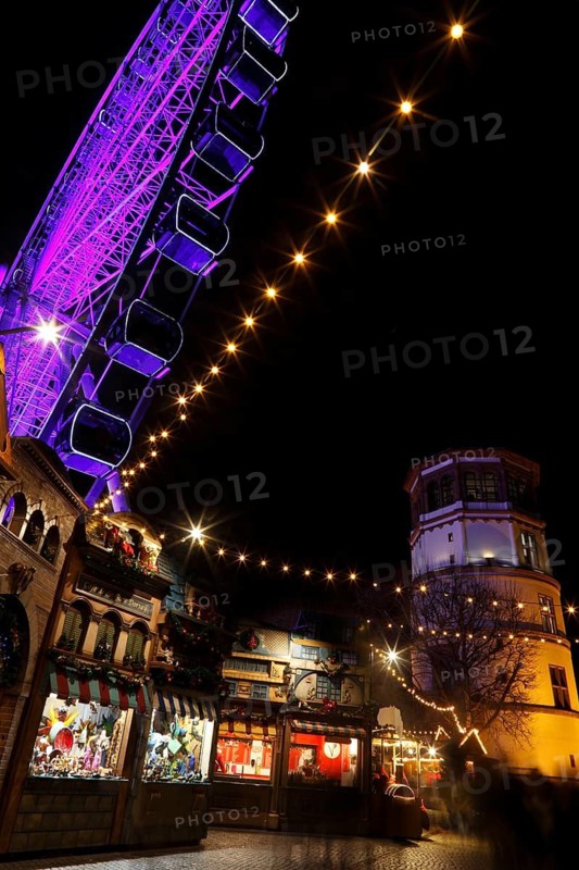 Christmas market with a ferris wheel on Burgplatz square, historic town centre, Dusseldorf, North Rhine-Westphalia, Germany