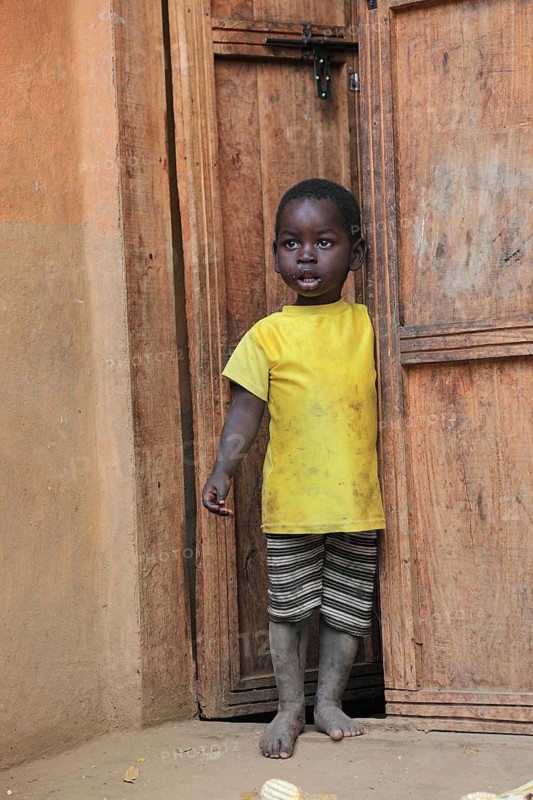 South Ethiopia, Ari people, little boy standing in the front door, Ethiopia