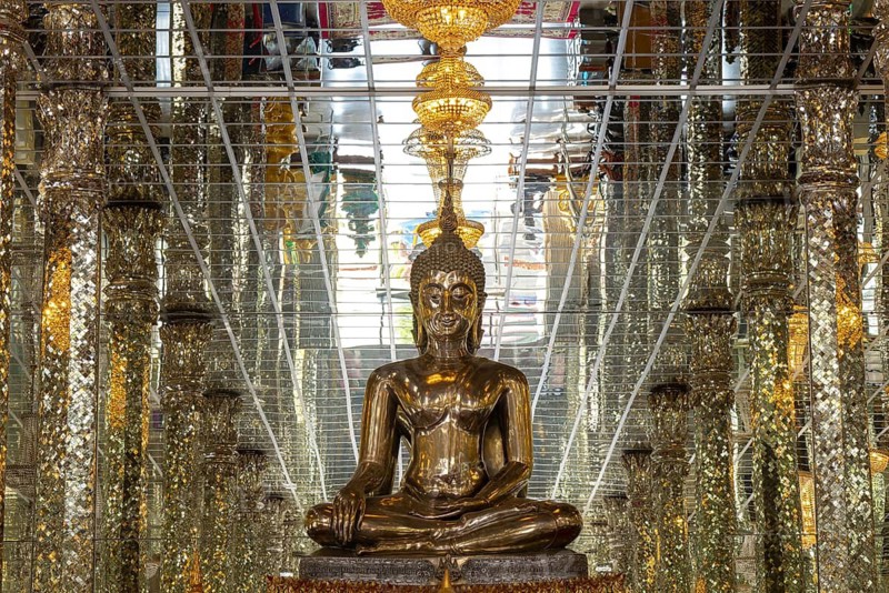 Silver Buddha statue, Bhumispara-mudra: Buddha Gautama at the moment of enlightenment, Wihan Kaeo (glass temple) : a breathtaking, mirrored ordination hall, Wat Muang, Ang Thong province, Isan, Thailand