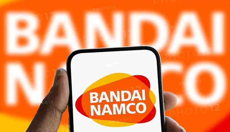 Bandai Namco logo is displayed on smartphone. Bandai Namco Entertainment Inc is a Japanese multinational video game publisher and the video game platform.