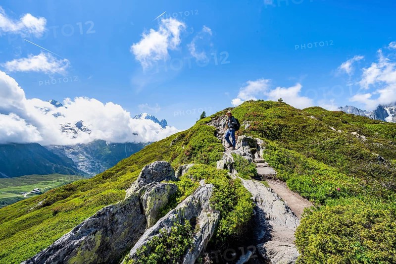 Mountaineers on a hiking trail with mountain views, hiking to the Aiguillette des Posettes, Chamonix, Haute-Savoie, France